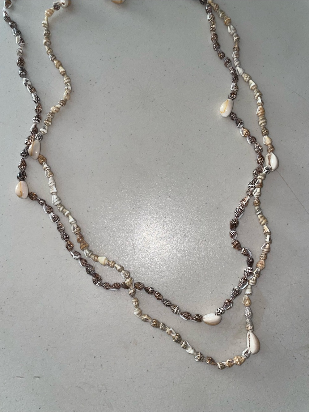 Long shell necklaces